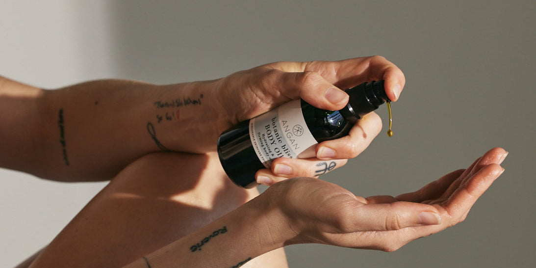 ANGAN autumn skincare ritual — body oil and salt scrub flatlay, Iceland